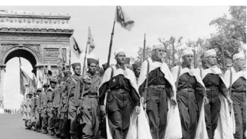 1957 Les Harkis défilent sous lArc de Triomphe1